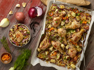 Chicken Drumsticks and vegetables on a sheet pan