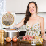 Woman in kitchen with Instant Pot