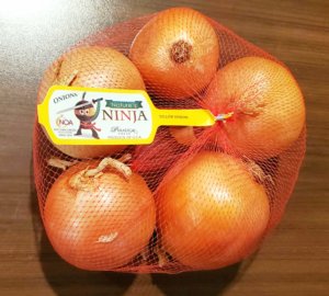 yellow onions with Nature's Ninja Onion bag label