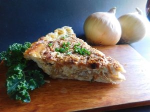 Southern Savory Onion Pie on cutting board